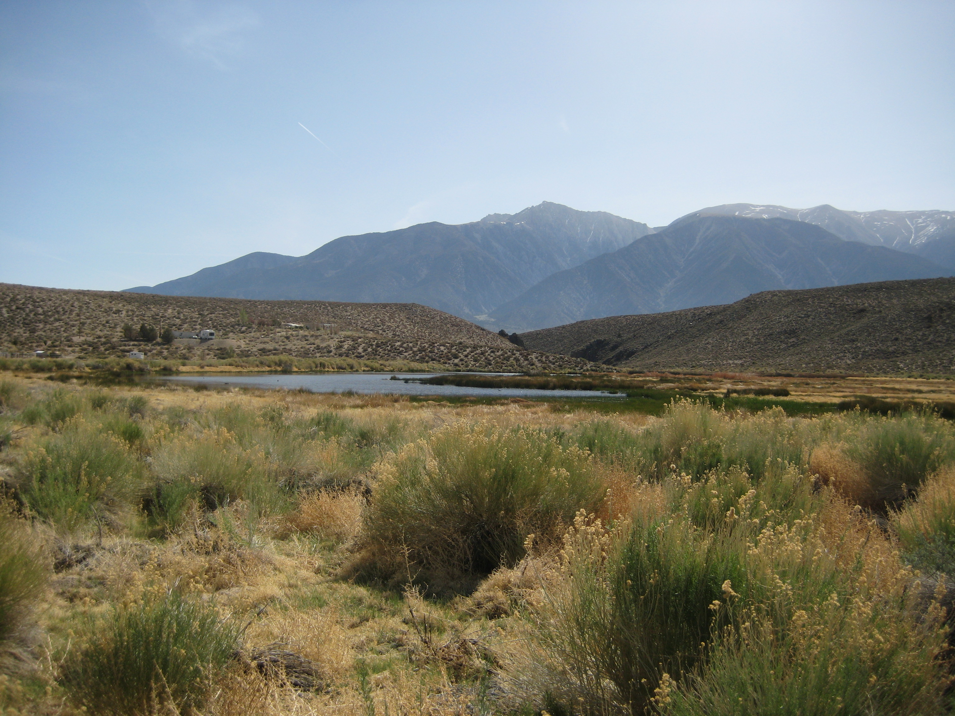 Overlooking the alkali ponds of Benton Hot Springs Ranch, with the Boundary Peak in the background Overlooking the alkali ponds of Benton Hot Springs Ranch, with the Boundary Peak in the background