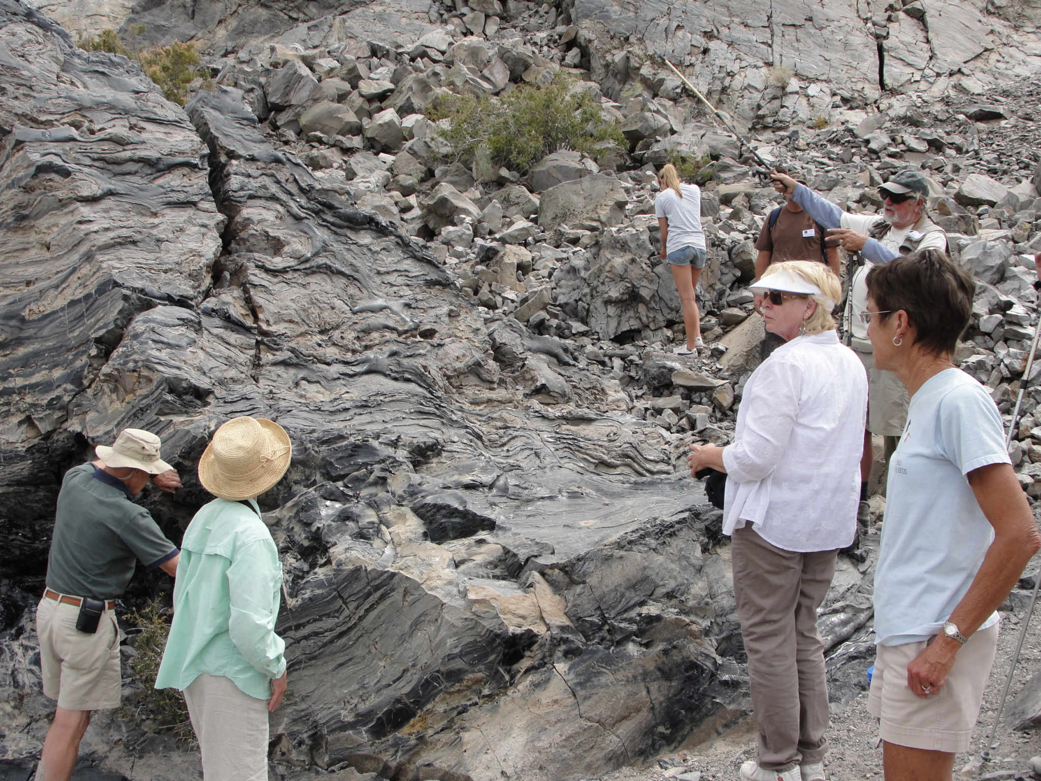 Tour participants get up close with the rock at the Panum Crater Tour participants get up close with the rock at the Panum Crater
